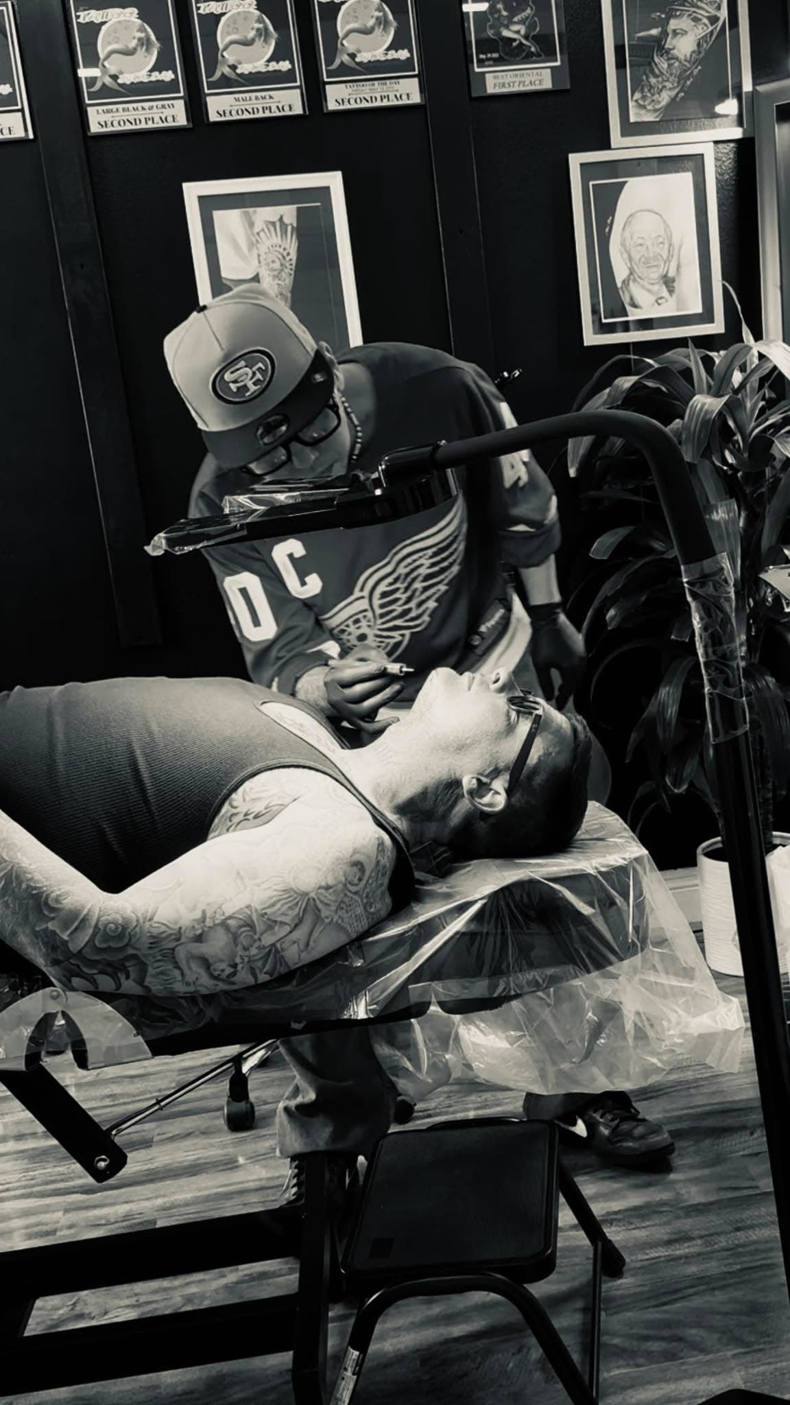 HoaDang tattooing in the studio